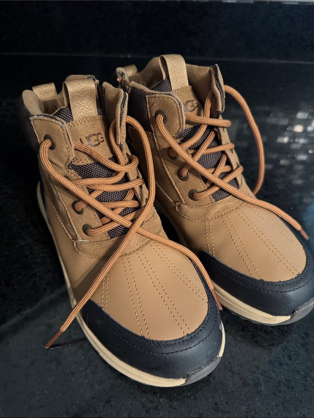 UGG Kids Tan and Black Lace-Up Duck Boots